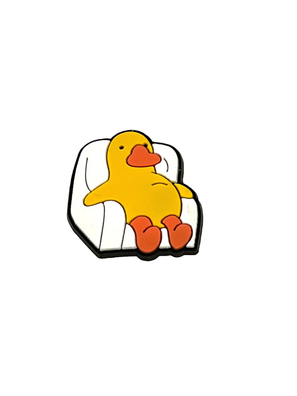 Duck relaxing on couch shoe charm
